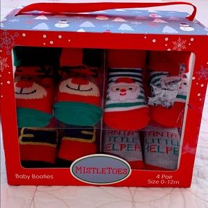 NIB 4 pack booties - 0-12 months